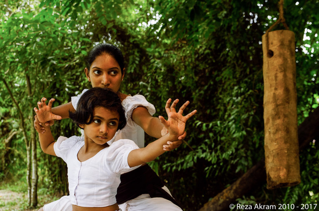 Since the distant past, women too practiced Angam in the same capacity as men. Female warriors such as Ratnapäli, Mahäpäli, Kaviläshapäli, and Navarathna Meniké, have been chronicled in many records throughout different eras of Sri Lanka's documented history. © Reza Akram 2010 - 2017