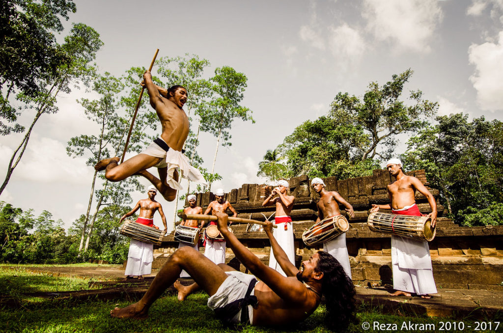 Traditional combat takes place amidst the rhythm of ancient Sinhala war drums. © Reza Akram 2010 - 2017